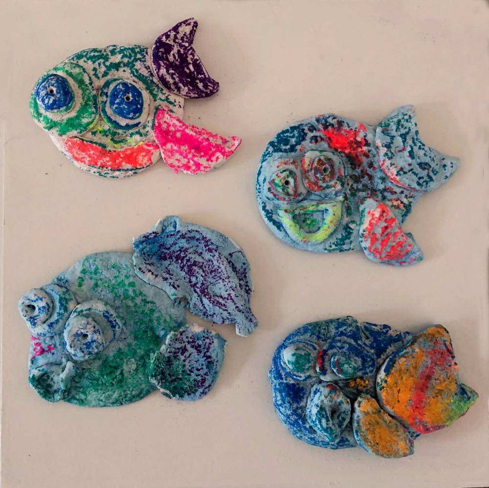 Painted clay fish - X